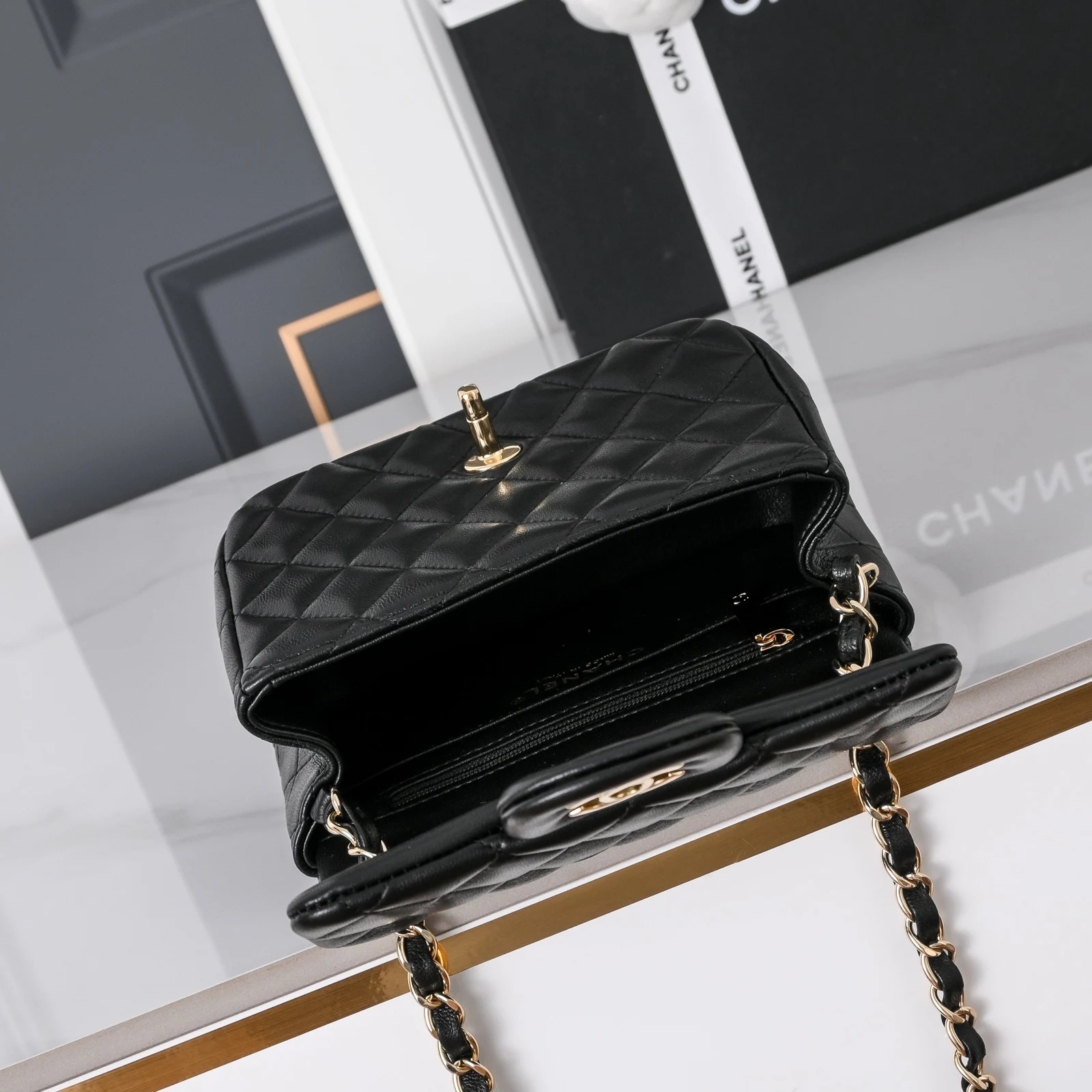 Mini Classic Handbag · Black Lambskin Black · Lambskin · Gold-Tone Metal