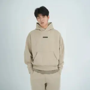 Fear of God Essentials · SS25 · Classic Fleece Hoodie · Timber