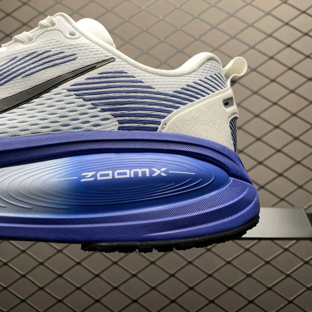 Nike Vomero 18 Men · White / Blue Tint / Light Marine / Black · HM6803-104