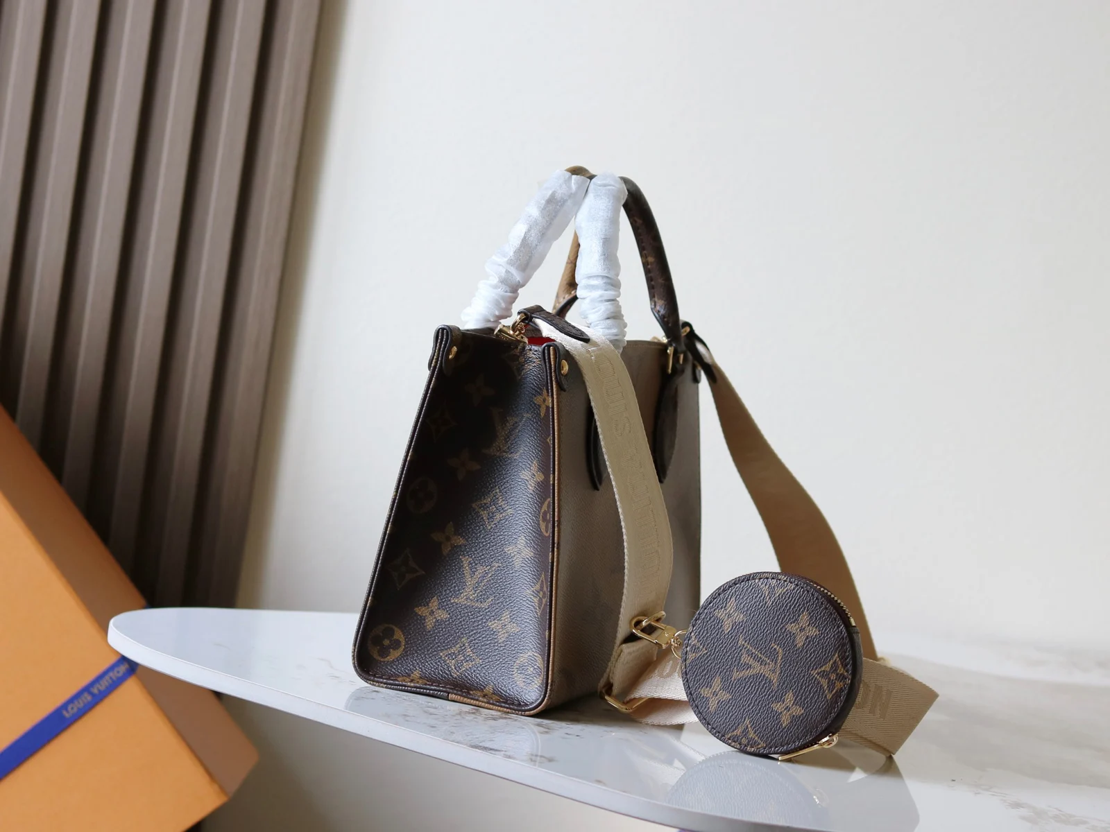 Louis Vuitton OnTheGo PM Monogram and Monogram Reverse Monogram / Monogram Reverse · M46373