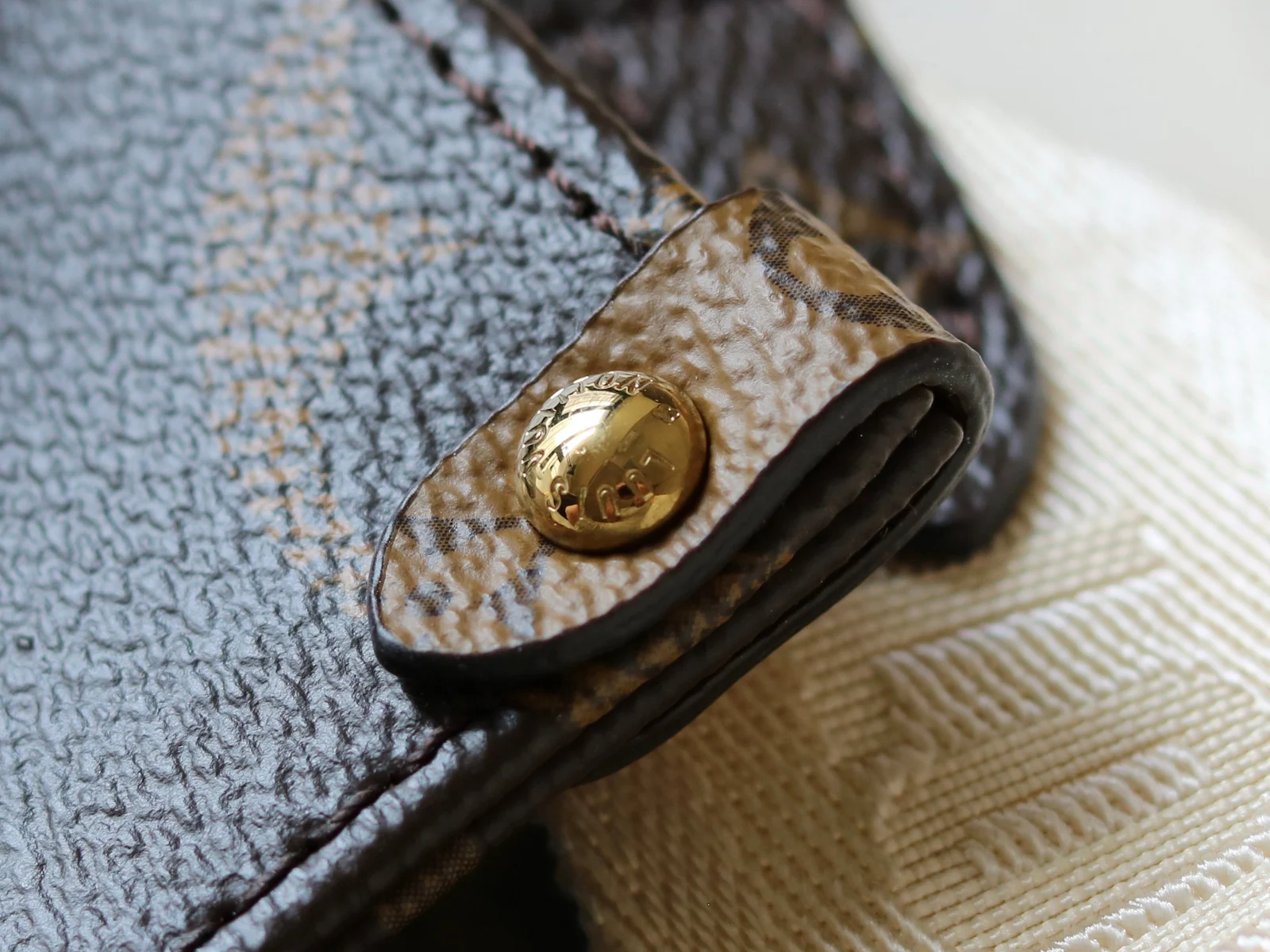 Louis Vuitton OnTheGo PM Monogram and Monogram Reverse Monogram / Monogram Reverse · M46373