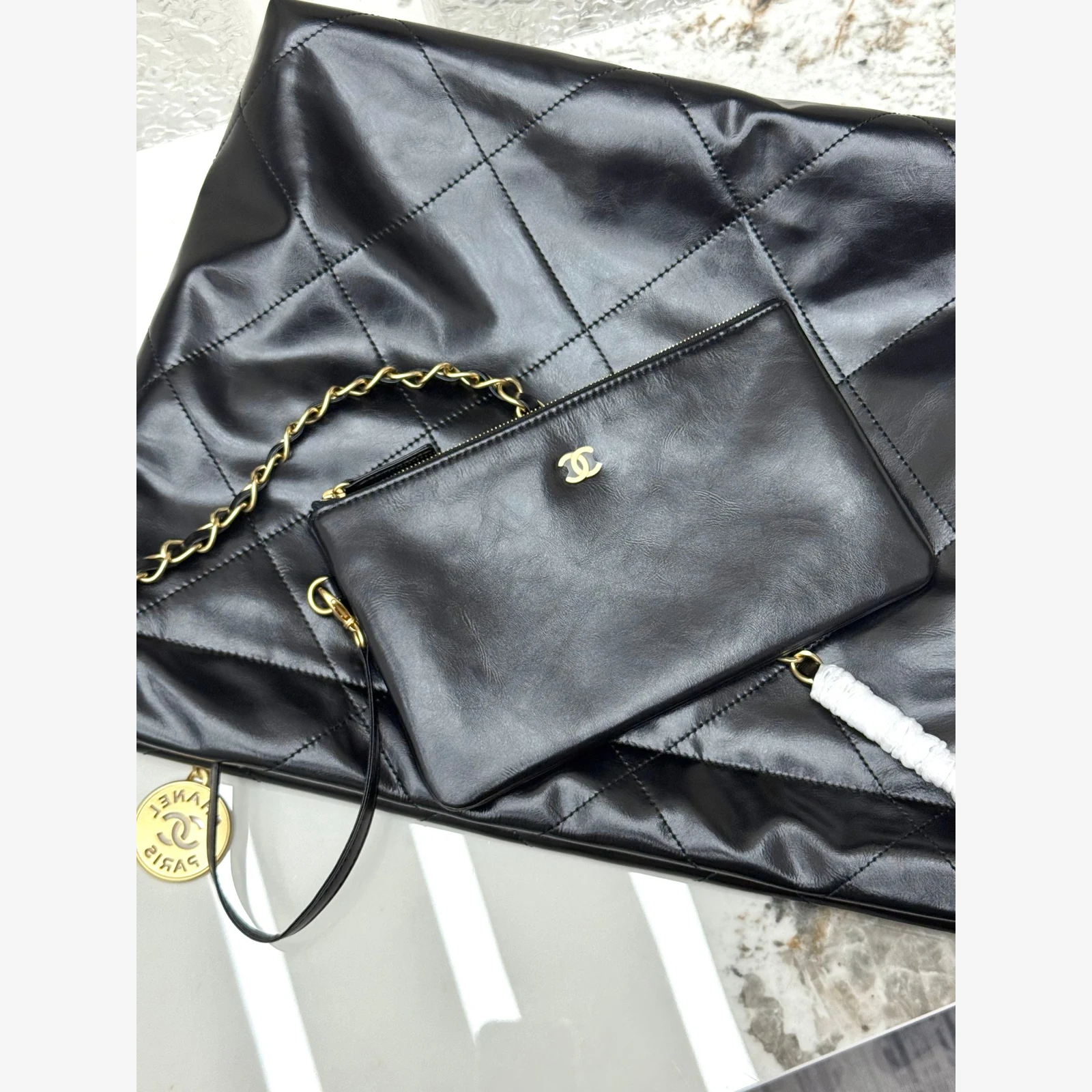 Chanel 22 Small Handbag · Black Shiny Calfskin Black · Shiny Calfskin · Gold-Tone Metal