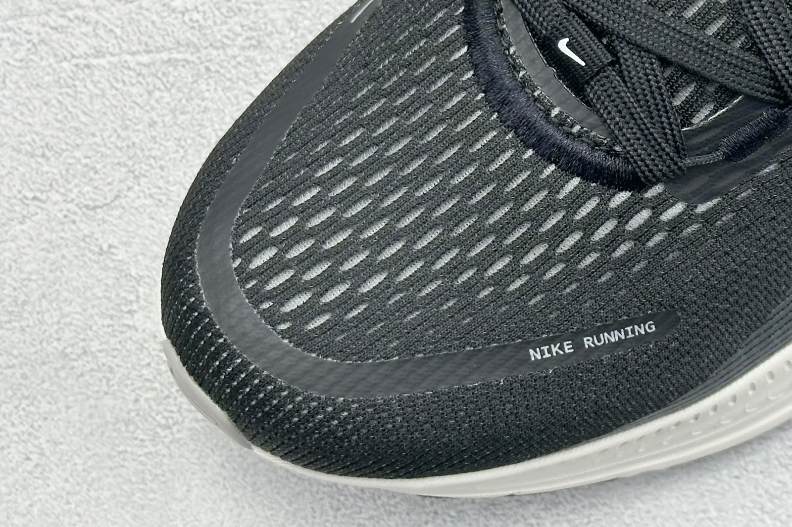 Nike Vomero 18 Men · Black / Coconut Milk / Light Iron Ore / Summit White · HM6803-007