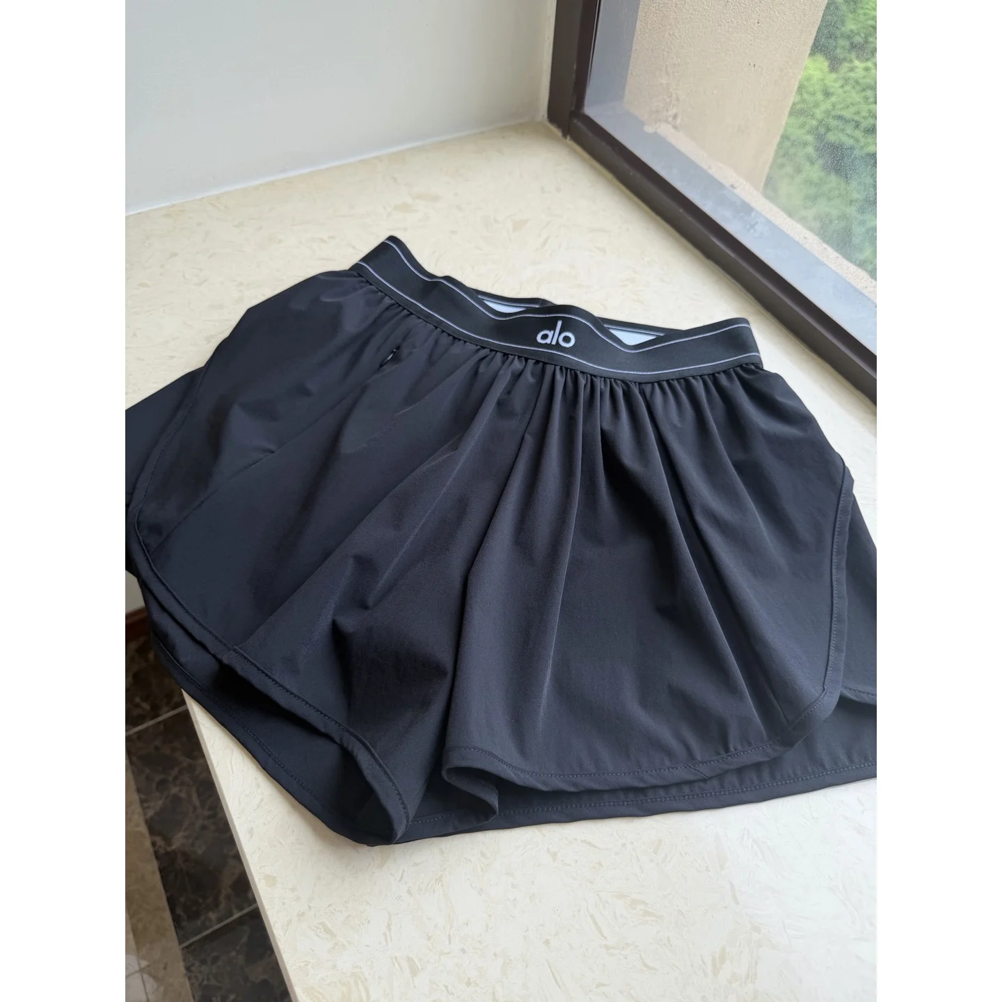 Alo Match Point Short Black · W6334R