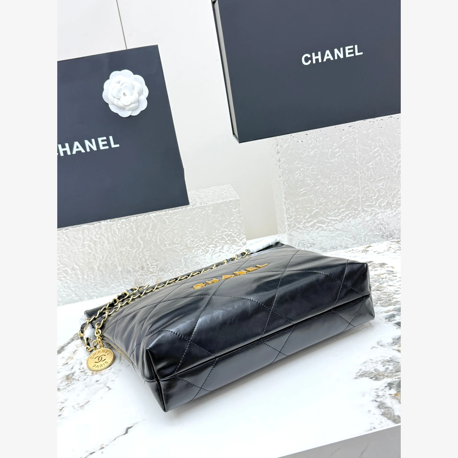 Chanel 22 Small Handbag · Black Shiny Calfskin Black · Shiny Calfskin · Gold-Tone Metal