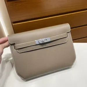 Hermès Kelly Depeches 25 Pouch Étoupe full view