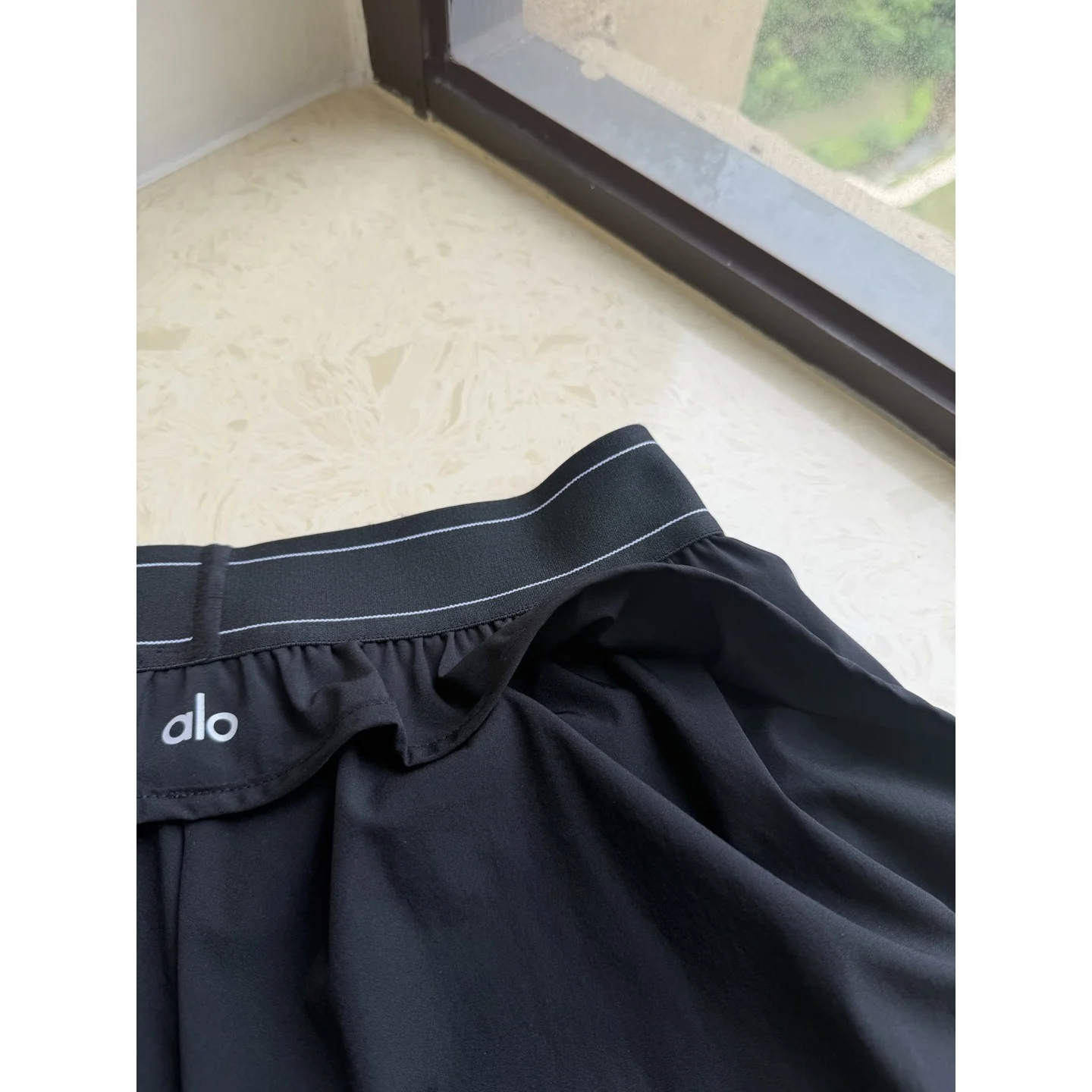 Alo Match Point Short Black · W6334R