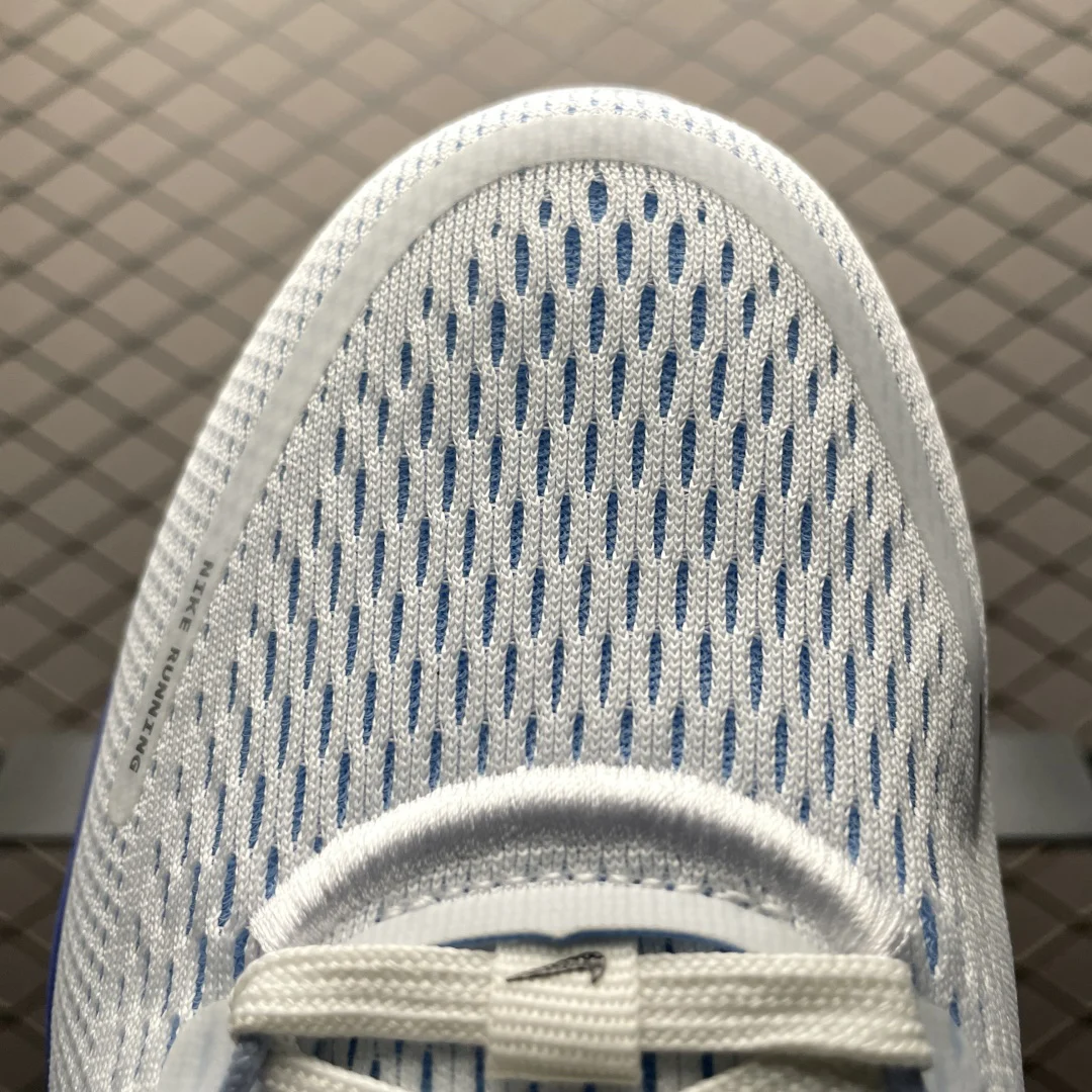 Nike Vomero 18 Men · White / Blue Tint / Light Marine / Black · HM6803-104