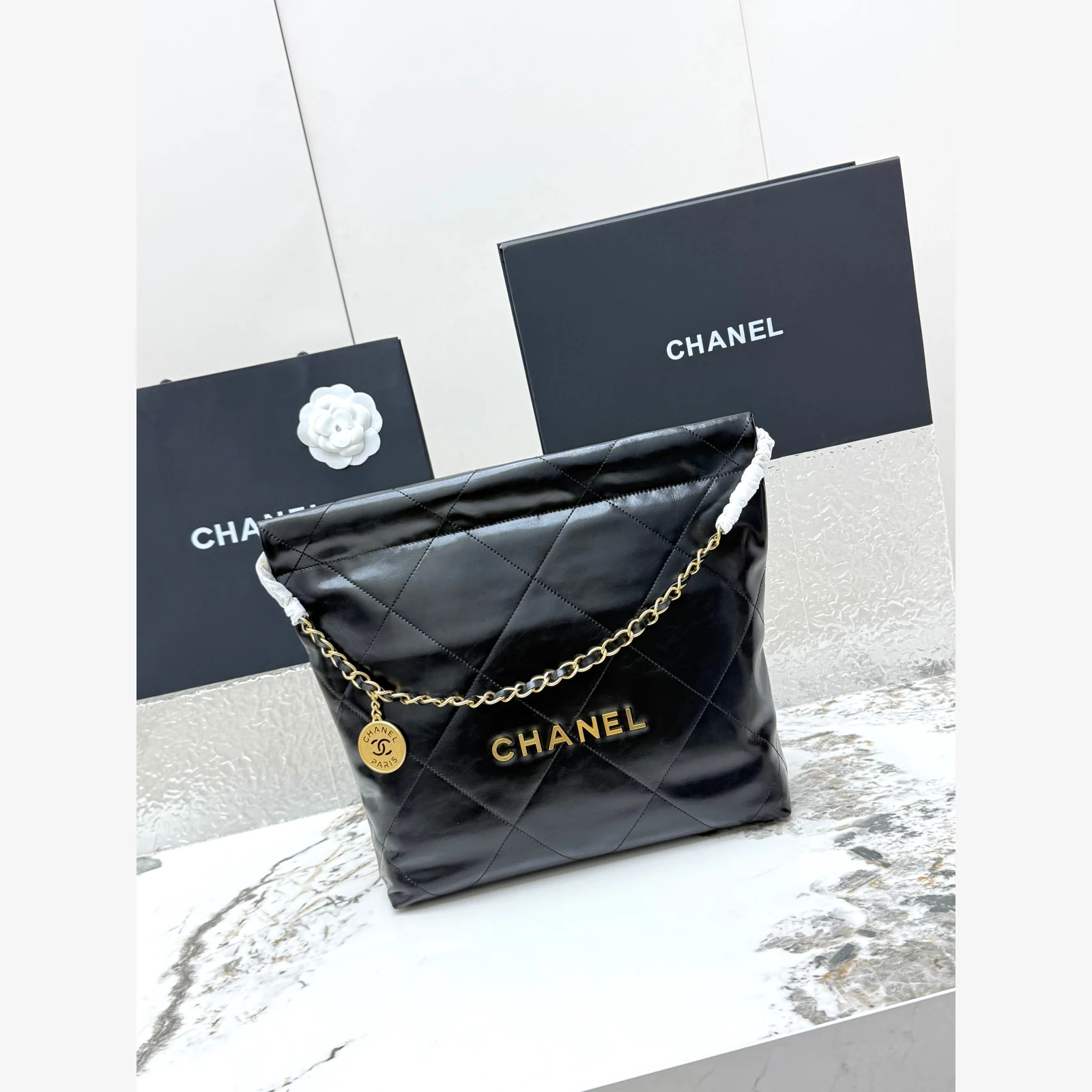 Chanel 22 Small Handbag · Black Shiny Calfskin Black · Shiny Calfskin · Gold-Tone Metal