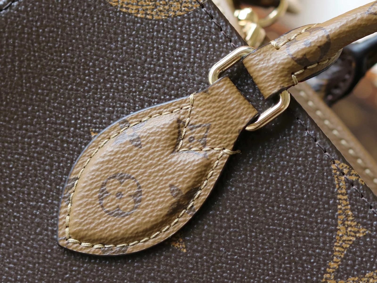 Louis Vuitton OnTheGo PM Monogram and Monogram Reverse Monogram / Monogram Reverse · M46373