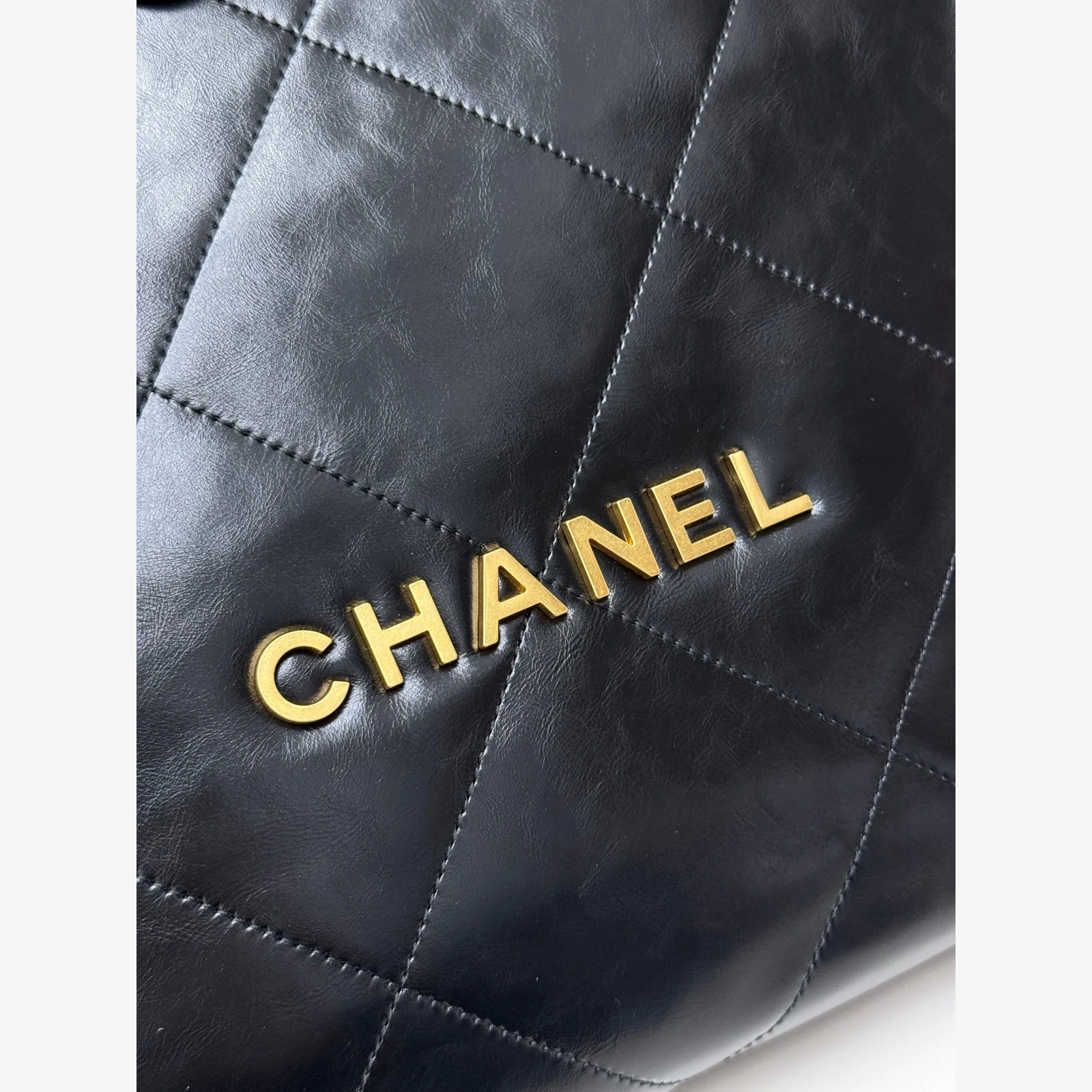 Chanel 22 Small Handbag · Black Shiny Calfskin Black · Shiny Calfskin · Gold-Tone Metal