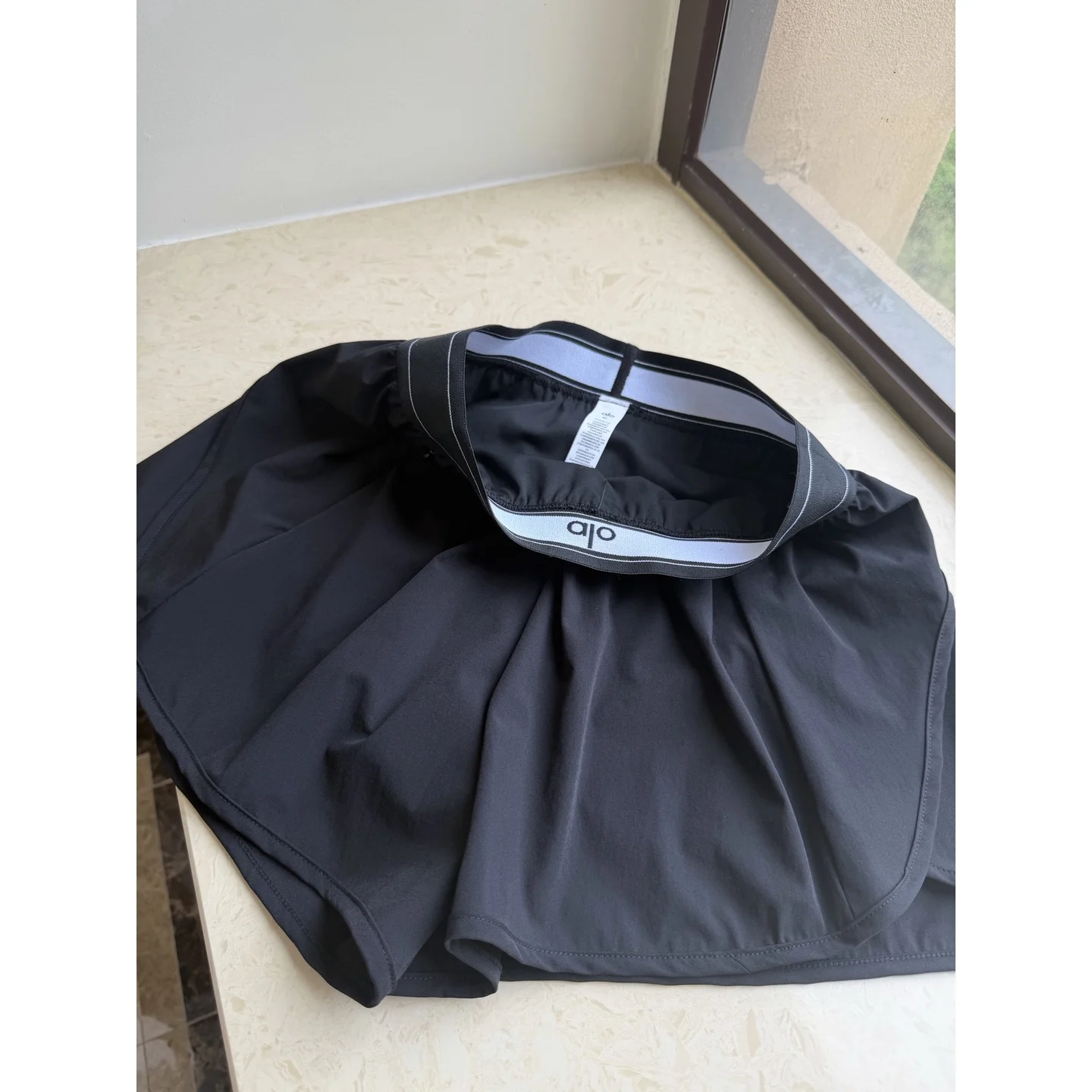 Alo Match Point Short Black · W6334R
