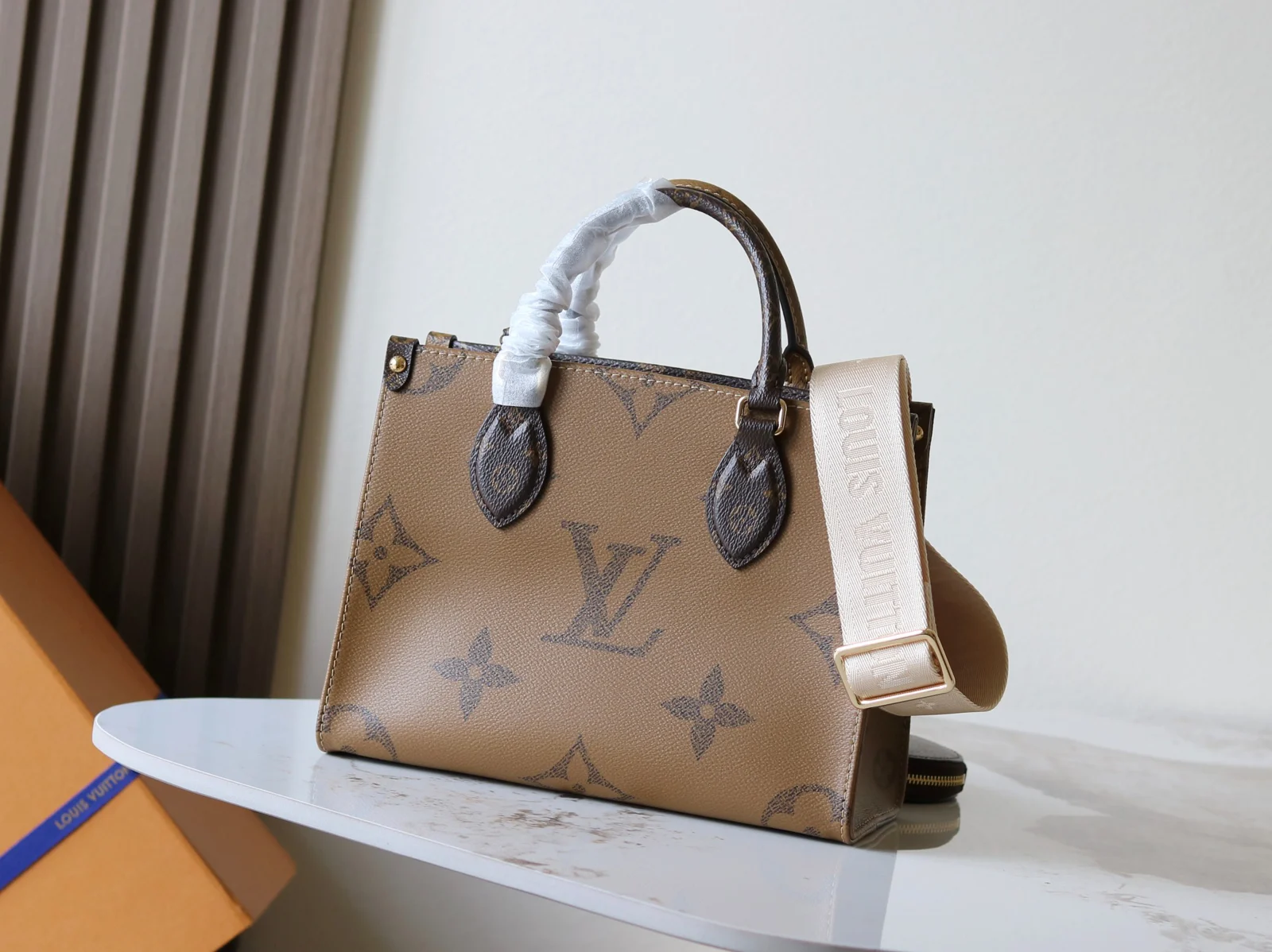 Louis Vuitton OnTheGo PM Monogram and Monogram Reverse Monogram / Monogram Reverse · M46373