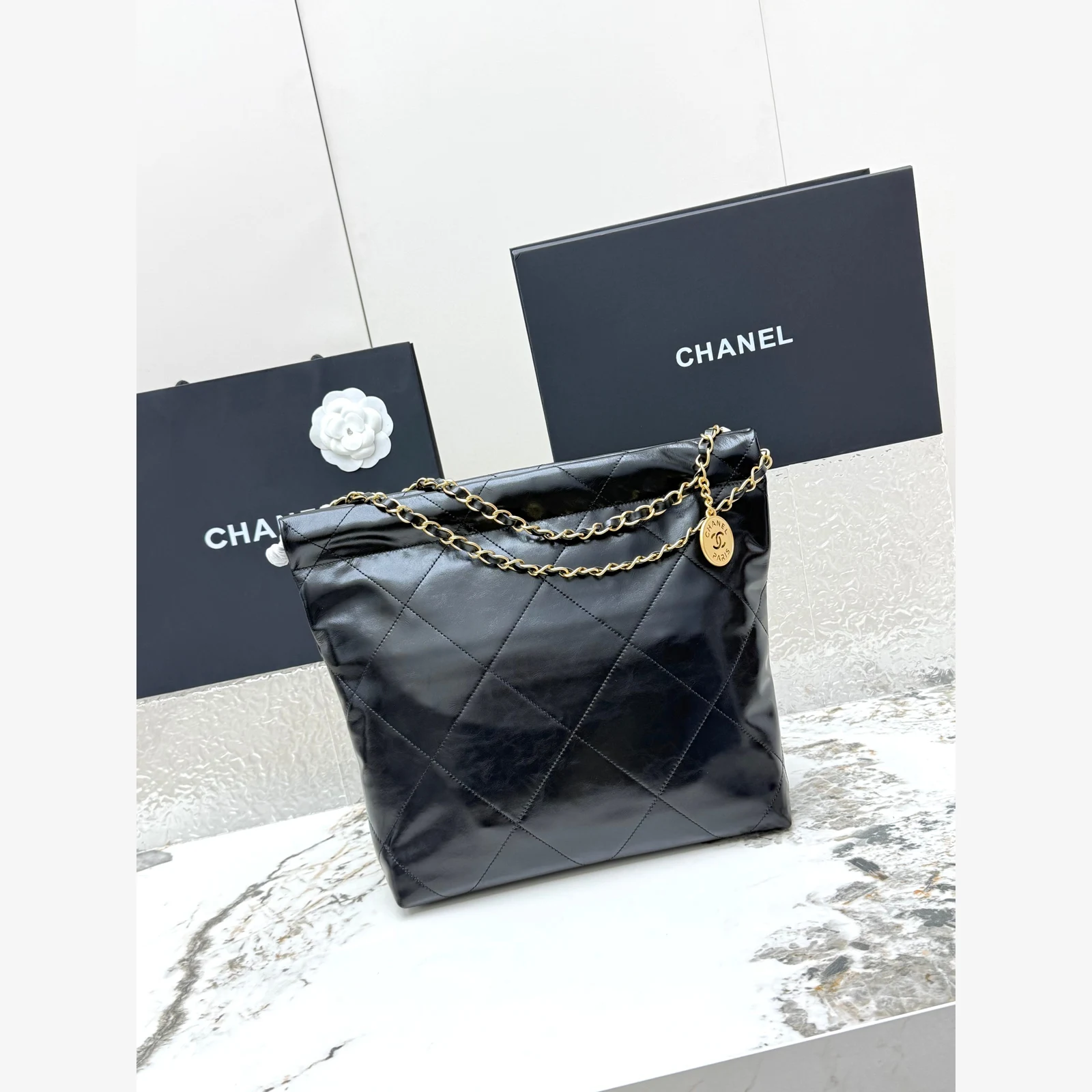 Chanel 22 Small Handbag · Black Shiny Calfskin Black · Shiny Calfskin · Gold-Tone Metal