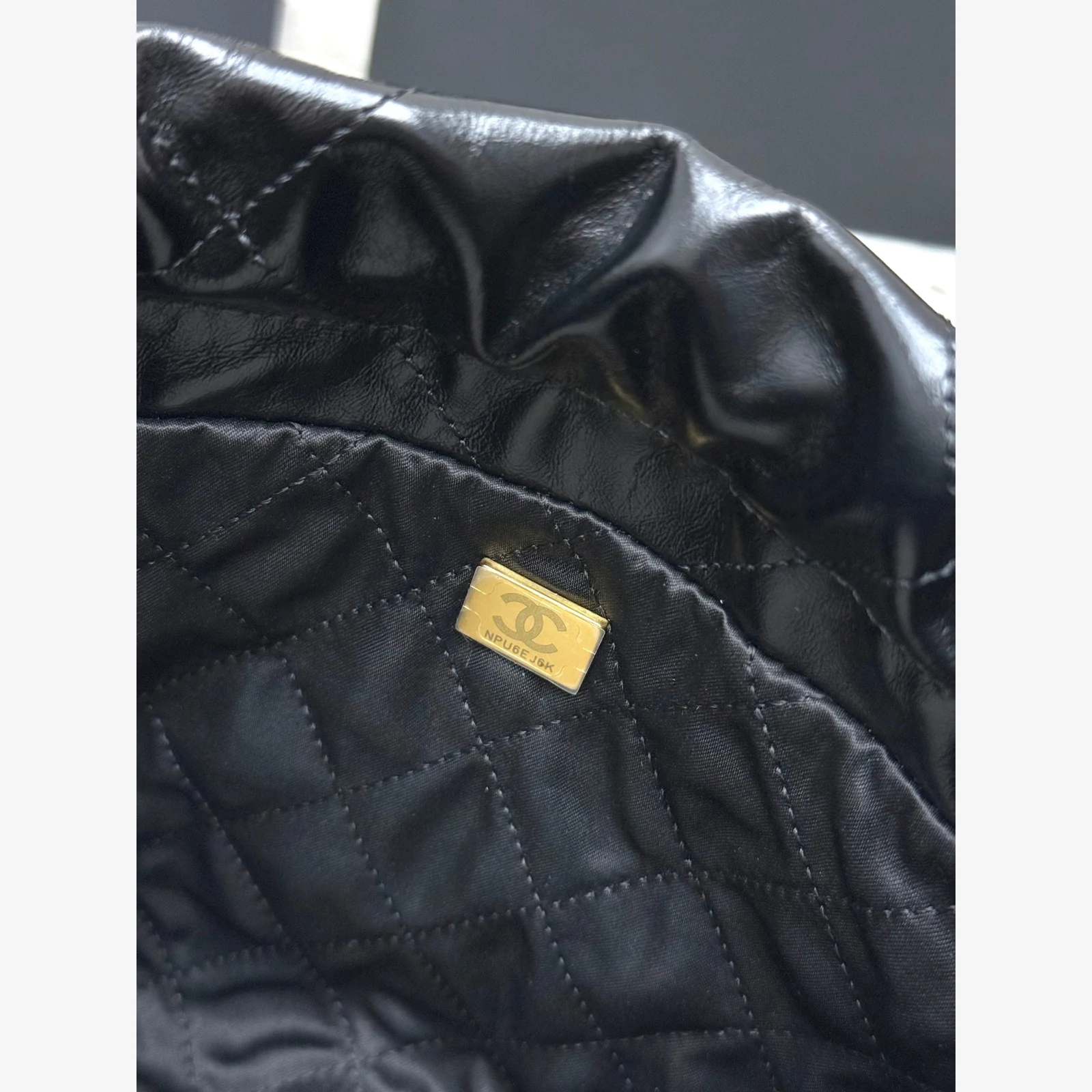 Chanel 22 Mini Handbag · Black Shiny Calfskin Black · Shiny Calfskin · Gold-Tone Metal