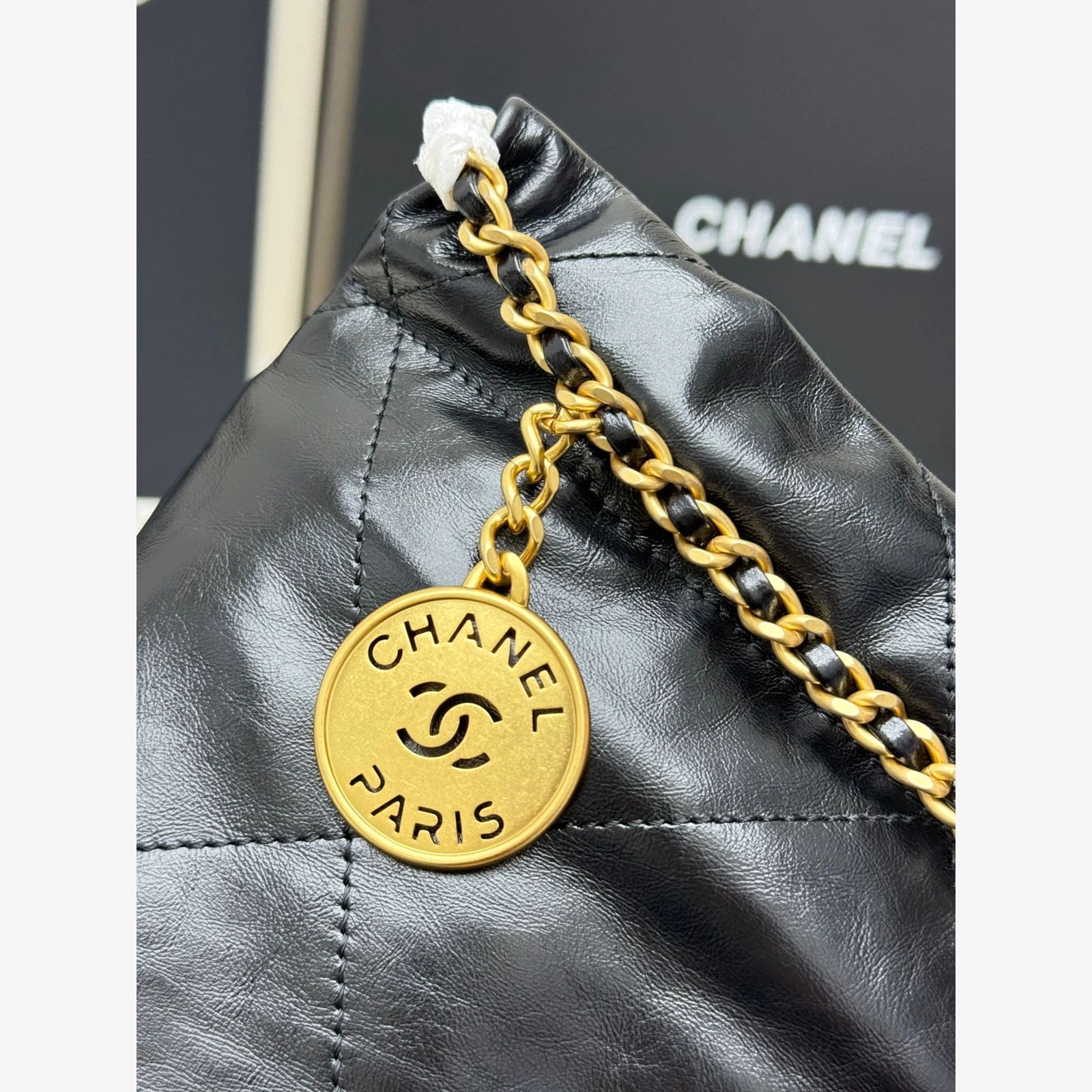 Chanel 22 Mini Handbag · Black Shiny Calfskin Black · Shiny Calfskin · Gold-Tone Metal
